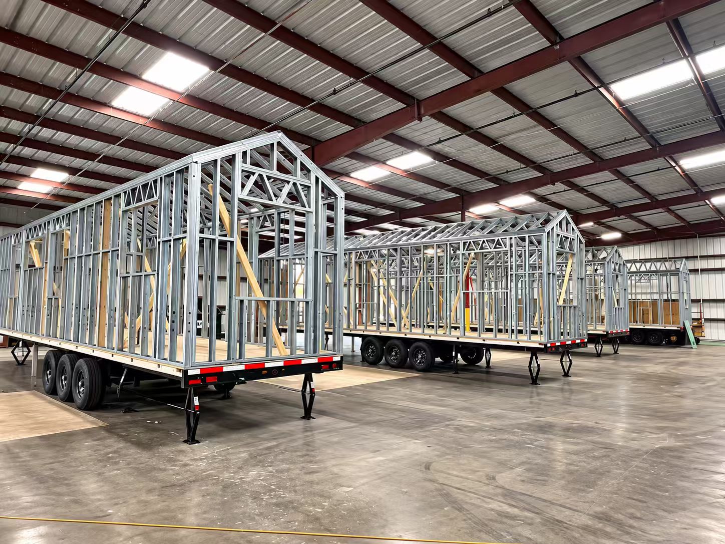 Supplied factory photograph of steel housing frames on trailer chassis